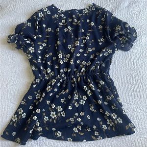 A floral blouse